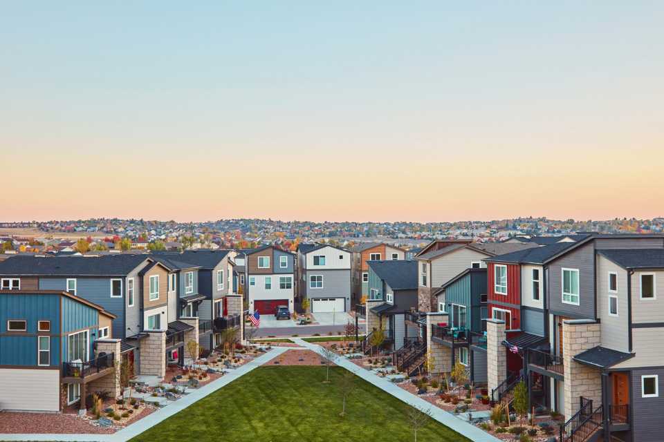 beautiful view of homes at dusk