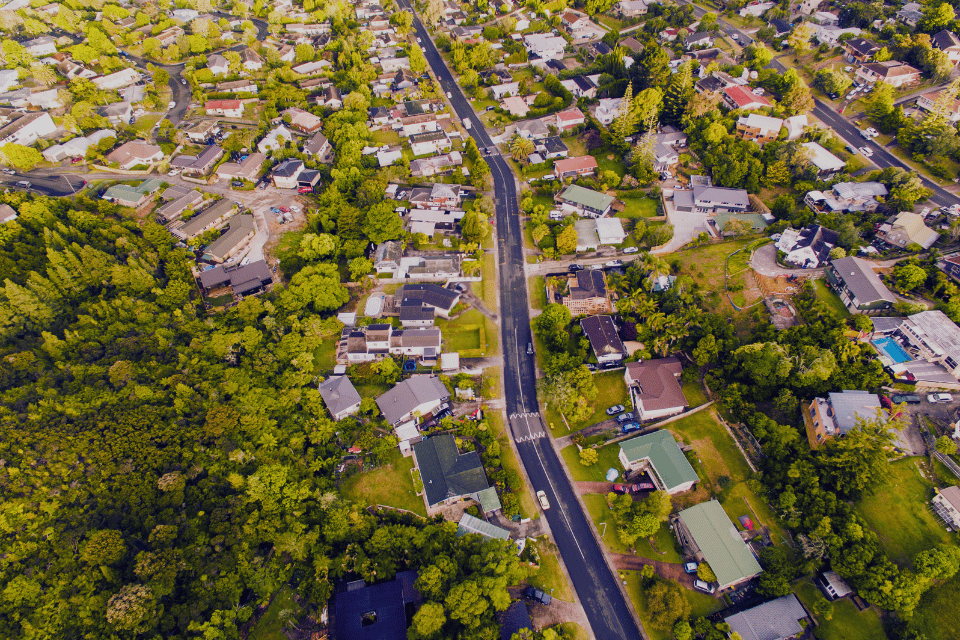 Image shows an aerial view of homes