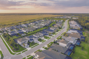 Image shows aerial view of housing development